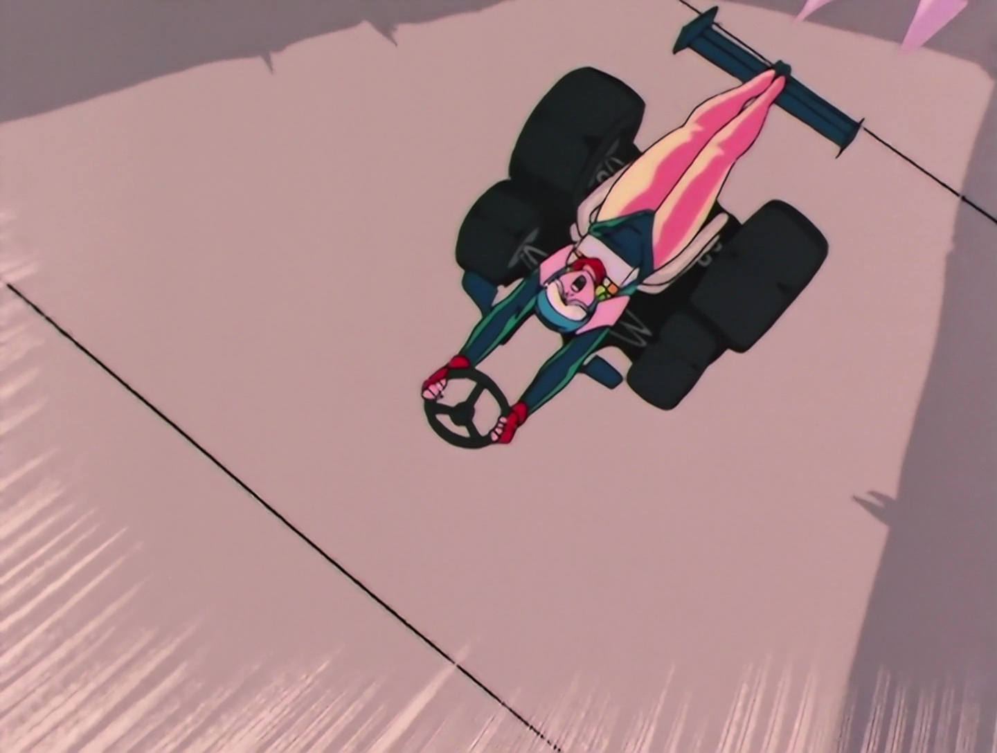 Steering is now lying on her back, and functioning as an actual car. She has the steering wheel held out in front of her.